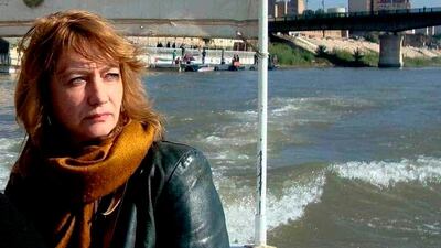 Hella Mewis rides a boat on the Tigris River, in Baghdad. The researcher went missing after she was seen cycling outside her office in the Iraqi capital on July 20. AP Photo, file picture