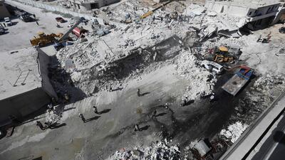 Buildings destroyed in an explosion at an arms depot in Syria's Idlib province on August 12, 2018. AFP