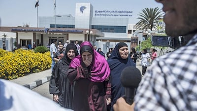 Distraught family members of passengers aboard the EgyptAir plane that disappeared en route from Paris to Cairo make their way to a gathering point at Cairo airport. Khaled Desouki / AFP