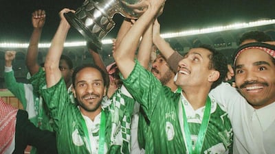 Members of the Saudi Arabian football team celebrate their victory over the UAE in 1996 at Shiekh Zayed Stadium in Abu Dhabi. BK Bangash / AP Photo