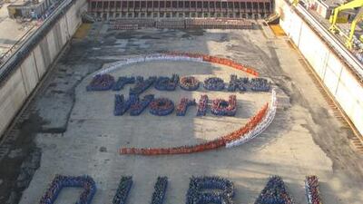Employees of Drydocks Workd celebrated the company's safety achievements by forming the shape of the company logo.