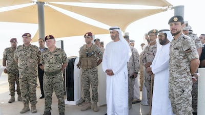 Hussein bin Abdullah, Crown Prince of Jordan (R), Sheikh Tahnoon bin Mohamed, Ruler's Representative in Al Ain Region (2nd R), Lt General Hamad Thani Al Romaithi, Chief of Staff UAE Armed Forces (3rd R), Sheikh Mohamed bin Zayed, Crown Prince of Abu Dhabi and Deputy Supreme Commander of the UAE Armed Forces (4th R) and King Abdullah II, King of Jordan (6th R), attend the UAE and Jordan joint military drill on Wednesday.