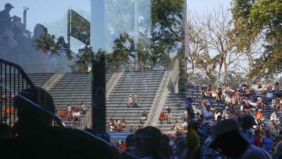 People watch a match in the grandstand at the 2014 US Open tennis tournament in New York. Shannon Stapleton / Reuters / August 27, 2014