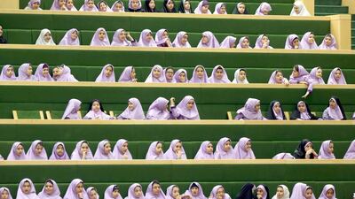 Iranian school girls attend a parliament session in Tehran on March 1, 2016. Atta Kenare / Agence France-Presse