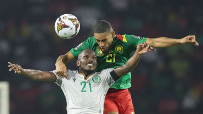 Cameroon defender Jean-Charles Castelletto is challenged by Comoros'forward El Fardou Nabouhane. AFP