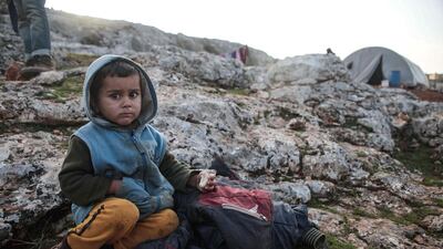 A displaced Syrian child near the town of Dana in Idlib after fleeing the Russian-backed regime offensive. AFP