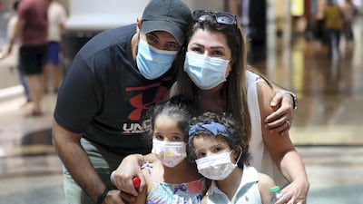The Ghnimat family shops for back-to-school equipment at Mall of the Emirates. Chris Whiteoak / The National