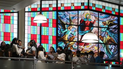 People pray during the Easter Sunday Mass held at St. Mary's Catholic Church in Dubai. Pawan Singh / The National