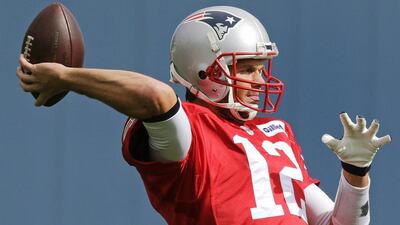 New England Patriots quarterback Tom Brady will take on the Indianapolis Colts aiming to extend his team's flawless start to the season. Charles Krupa / AP Photo