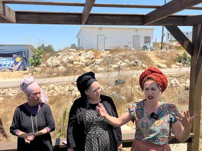 Some Evyatar residents celebrate the legalisation of their outpost. Thomas Helm / The National