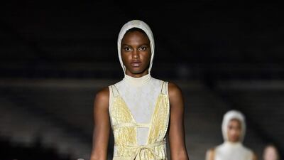 A model walks the runway during the Dior Cruise show 2022 at Panathenaic Stadium on June 17, 2021 in Athens, Greece. AFP
