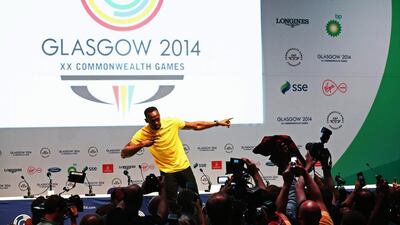 Jamaica’s Usain Bolt enacts his post-run famous pose on arrival in Glasgow yesterday. Cameron Spencer / Getty Images