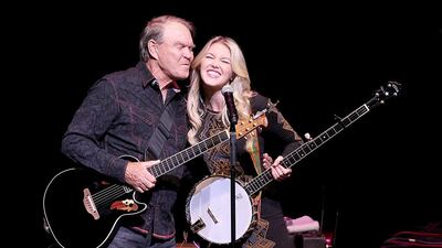 Musician Glen Campbell and his daughter Ashley Campbell perform in Austin, Texas, in 2012. Gary Miller/FilmMagic/Getty Images