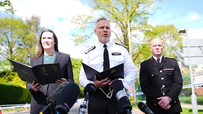 From left, Met Police deputy assistant commissioner Vicki Evans, deputy commissioner Matt Jukes and London Fire Brigade's deputy commissioner Mathew Walker at a briefing outside the Kenton United Synagogue. PA