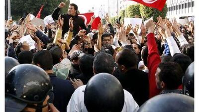 Protesters in Tunis yesterday call for the former ruling Constitutional Democratic Rally party to withdraw from the interim government.