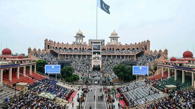 Indians and Pakistanis gather to watch the beating the retreat ceremony at the Attari-Wagah border. AFP