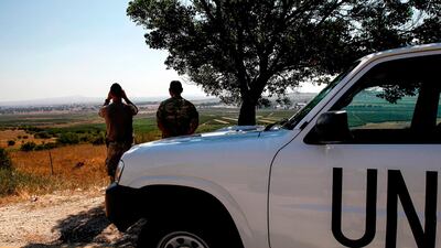 UN peacekeepers look out towards Syria from the Israeli-annexed Golan Heights on July 22, 2018. AFP
