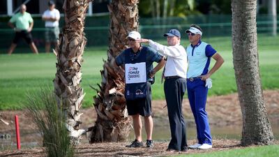 Ian Poulter, right, gets a ruling from Steve Rintoul of the PGA Tour on the 14th hole during the fourth round of the Honda Classic at PGA National Resort & Spa - Champion Course on March 2, 2015 in Palm Beach Gardens, Florida. Sam Greenwood / Getty Images