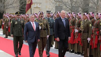 Norway's King Harold, center right, and Jordan's King Abdullah II review an honor guard at the Husayniyah Palace, in Amman, Jordan. AP Photo