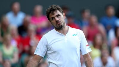 Stan Wawrinka reacts during his match against Daniil Medvedev on Day 1 of the Wimbledon Championships. Steven Paston / Press Association