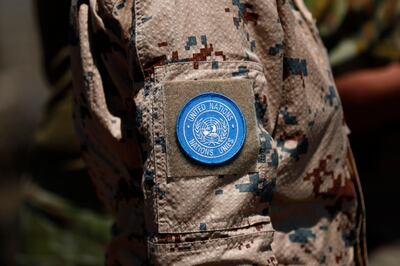 A UN soldier's uniform at Ben Tal overlooking the Israeli-Syrian border in August. The organisation has so far succeeded in ensuring that there is no Third World War. EPA