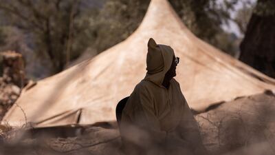 A villager near tents outside their destroyed house following an earthquake in Tafeghaghte, in the El Haouz region. Bloomberg