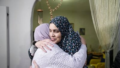 Marah Bakir, right, was among the first Palestinian detainees to be released by Israeli authorities in a swap between Israel and Hamas. AP