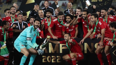 Al Ahly players celebrate with the trophy. AFP