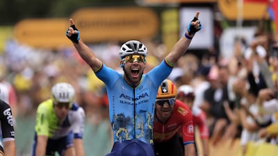 British rider Mark Cavendish of Astana Qazaqstan Team celebrates as he crosses the finish line on Stage 5 to overtake Eddie Merckx with a record 35th Tour de France stage win. EPA