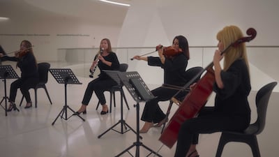 The ensemble is made up of 55 female musicians, from 25 different countries, and features Middle Eastern string instruments such as the qanun and oud. Photo: Expo City Dubai