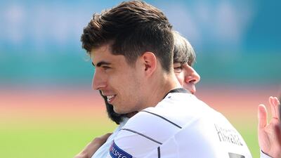 Coach Joachim Low of Germany congratulates Kai Havertz on his 22nd birthday. Getty