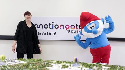 For Smurf characters, costume designer Wendy M Benitez, left, says because of the UAE climate, she had to ditch furry costumes in favour of ones made of fleece. Reem Mohammed / The National