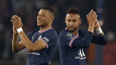 Kylian Mbappe and Neymar applaud the crowd after PSG clinch the Ligue 1 title. EPA