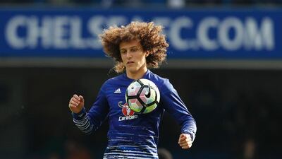 Chelsea's Brazilian defender David Luiz warms up ahead of the English Premier League football match between Chelsea and Leicester City at Stamford Bridge in London on October 15, 2016. Adrian Dennis / AFP