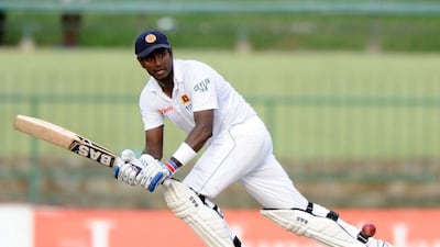 Sri Lankan cricket captain Angelo Mathews plays a shot during the third day of the third and final Test match against Pakistan at Pallekele on Sunday. Lakruwan Wanniarachchi / AFP / July 5, 2015