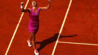Sara Errani of Italy celebrates victory after her women's singles quarter-final match against Angelique Kerber of Germany. Errani will face Samantha Stosur of Australia next in a semi-final match.