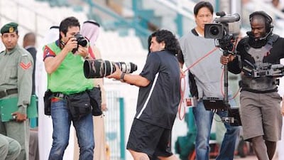 Diego Maradona, the Al Wasl coach, had a bit of fun with photographers during yesterday’s 2-1 defeat to Dubai.
