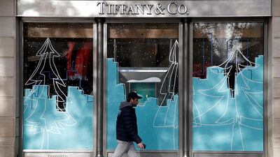 A man walks by a Tiffany & Co shop on the Champs Elysees in Paris. French luxury group LVMH is buying the chain in its biggest-ever acquisition. EPA