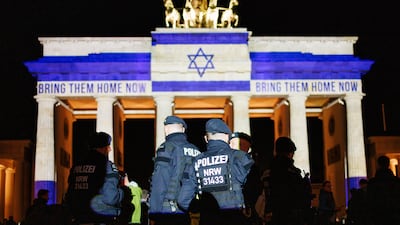 Berlin's Brandenburg Gate was lit up in the colours of the Israeli flag to mark the anniversary of Hamas's October 7 attack two weeks ago. EPA