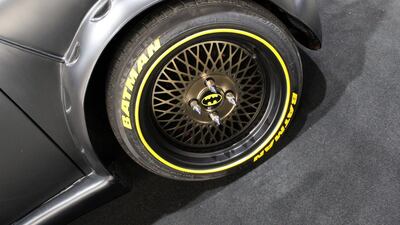 A Batman inspired wheel is on display.