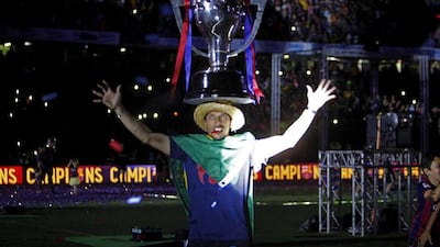 Barcelona’s Brazilian Adriano celebrates with supporters their UEFA Champions League title at Camp Nou stadium in Barcelona, Spain, 07 June 2015. Barcelona clinched a fifth European champions title with a 3-1 victory over Juventus in the UEFA Champions League final in Berlin on 06 June 2015. EPA/Marta Pérez