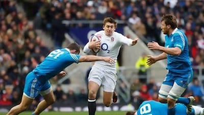 Toby Flood, centre, the fly-half who was recalled for yesterday's game, kicked all of England's points with six penalties. Eddie Keogh / Reuters