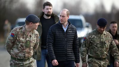 Prince William meets soldiers stationed in Poland. EPA