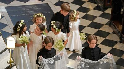 Bridesmaids and Page Boys arrive at the chapel. AFP