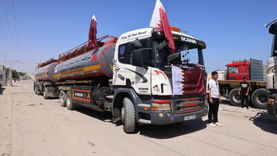 A tanker bearing Qatari flags and carrying fuel for Gaza's sole power plant arrives at the Rafah crossing in the southern Gaza Strip on June 28. AFP