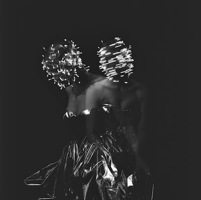 American artist Guinevere Van Seenus based her work on a strapless corset dress in crushed silver poly faille. Photo: Alexander McQueen