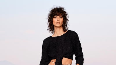 A beach-to-dinner look with a tied-front top and floor-length skirt