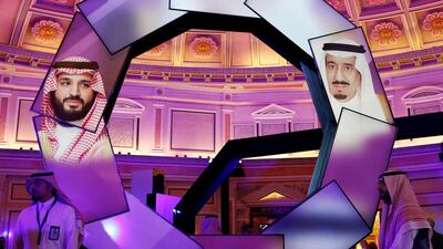 Pictures of Saudi Arabia's Crown Prince Mohammed bin Salman and Saudi Arabia's King Salman bin Abdulaziz are seen during the launching of National Industrial Development and Logistics Program (NIDLP) in Ritz-Carlton hotel in Riyadh, Saudi Arabia January 28, 2019. Reuters