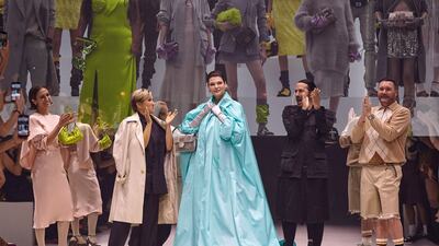 Linda Evangelista, centre, made her first runway appearance since revealing last year how cosmetic procedures had left her 'brutally disfigured'. She joined Fendi's show at New York Fashion Week on Friday. AFP