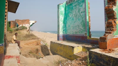 Name plates still hang outside the neatly painted entrances; inside tattered clothes and slippers strewn on the floor—a remnant of their former owners—with walls still adorned with beautiful hand painted vines.